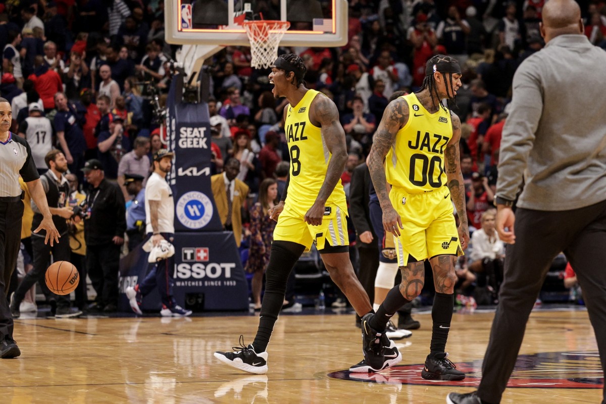 Utah Jazz forward Jarred Vanderbilt (8) and guard Jordan Clarkson (00) react to defeating the New Orleans Pelicans after an over time at Smoothie King Center.