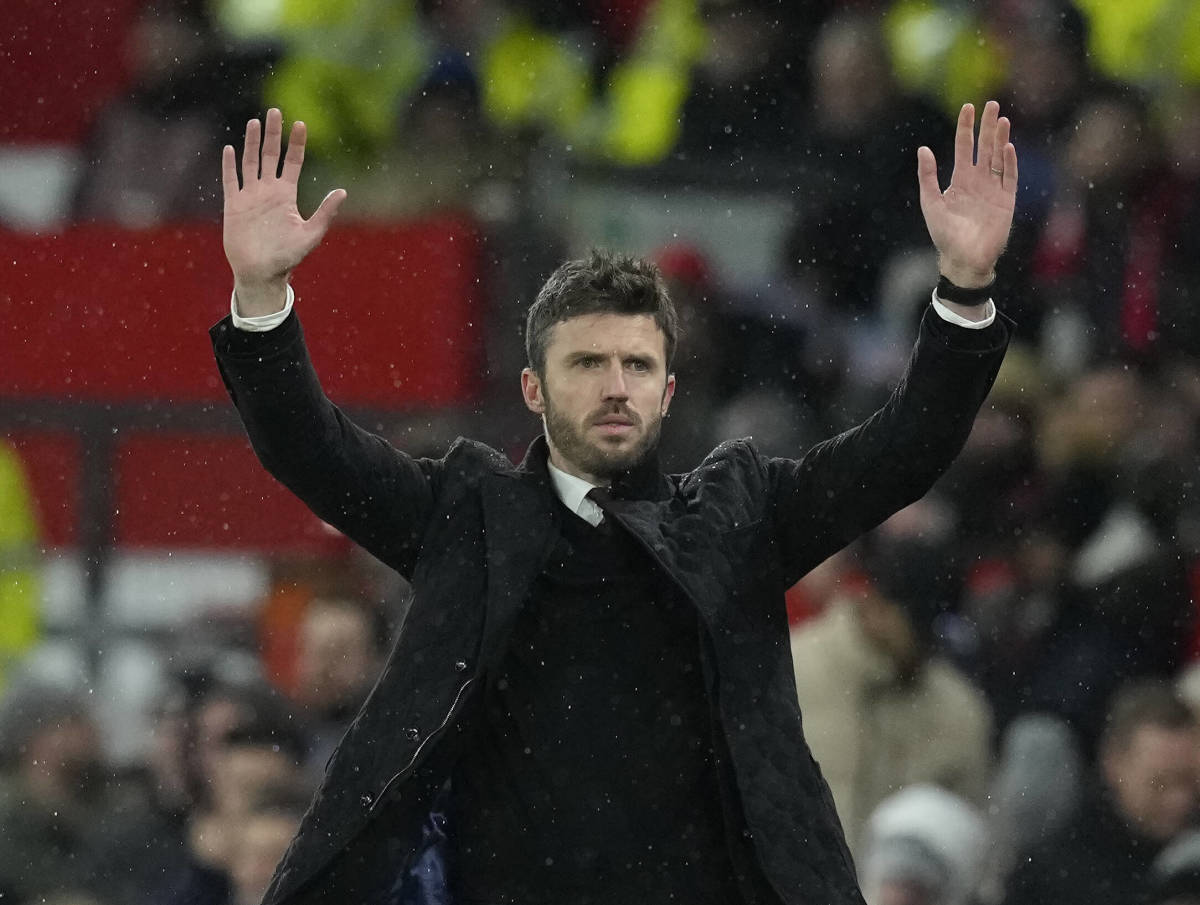 Michael Carrick pictured waving to fans at Old Trafford after overseeing a 3-2 win over Arsenal as Manchester United caretaker manager in December 2021