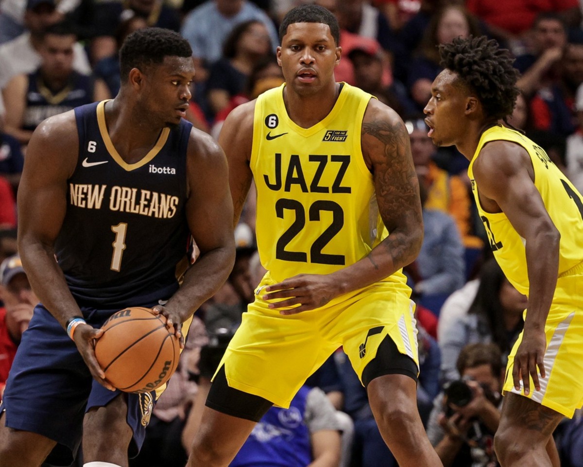 New Orleans Pelicans forward Zion Williamson (1) posts up against Utah Jazz forward Rudy Gay (22) and guard Mike Conley (11) during the second half at Smoothie King Center.