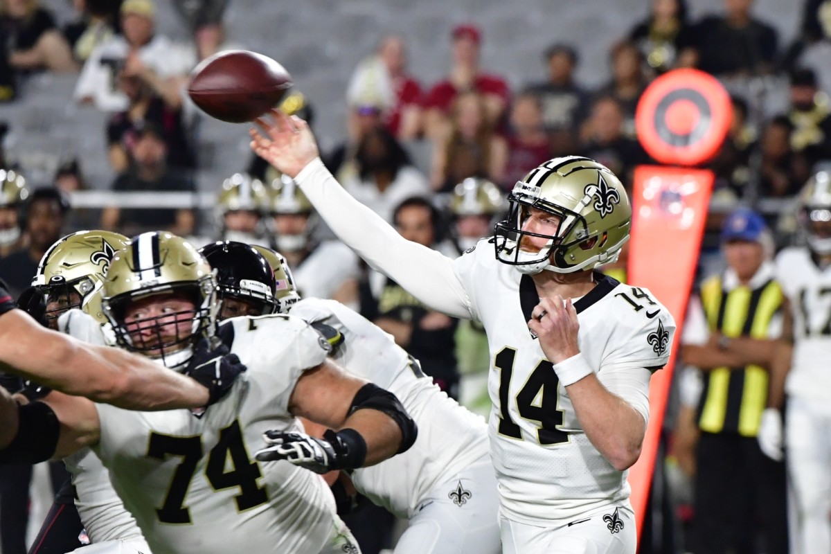 New Orleans Saints quarterback Andy Dalton (14) throws against the Arizona Cardinals. Mandatory Credit: Matt Kartozian-USA TODAY Sports