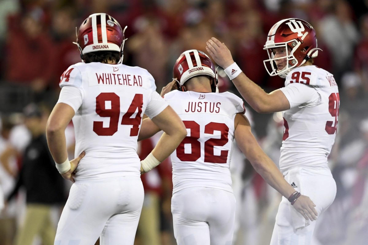 Sean Wracher (right, No. 95) has been one of the best long snappers in the country since arriving in Bloomington from Cleveland. (USA TODAY Sports)