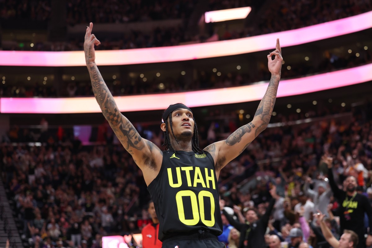 Utah Jazz guard Jordan Clarkson (00) reacts after making a three-point basket against the Houston Rockets in the third quarter at Vivint Arena.