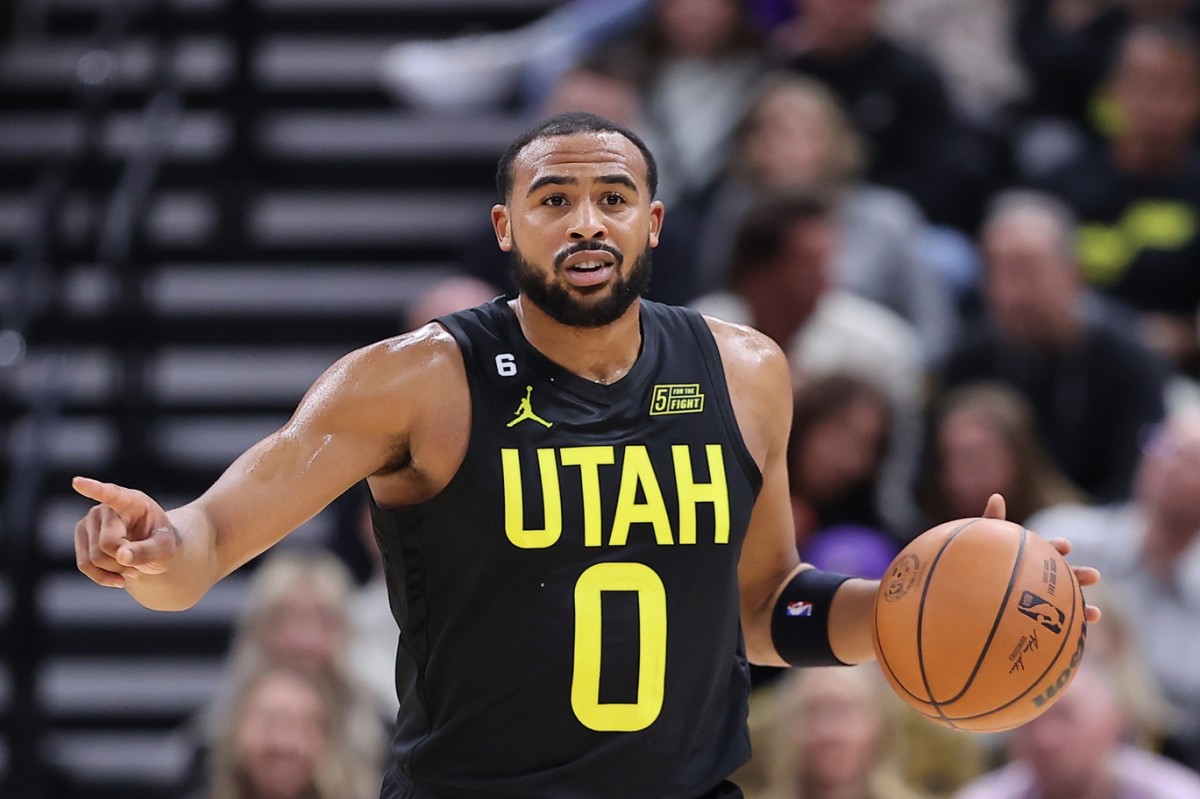 Utah Jazz guard Talen Horton-Tucker (0) brings the ball up the court against the Houston Rockets in the third quarter at Vivint Arena.