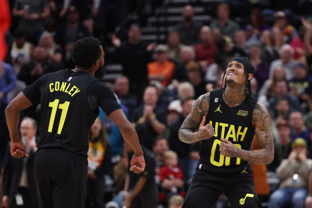 Utah Jazz guard Jordan Clarkson (00) reacts to a play by guard Mike Conley (11) against the Houston Rockets in the first half at Vivint Arena.