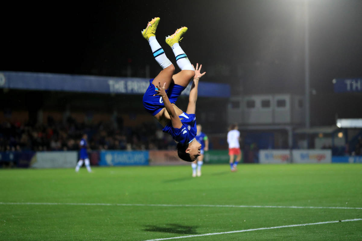 Sam Kerr pictured performing a backflip after scoring four goals for Chelsea in an 8-0 win over Vllaznia in the Women's Champions League in October 2022