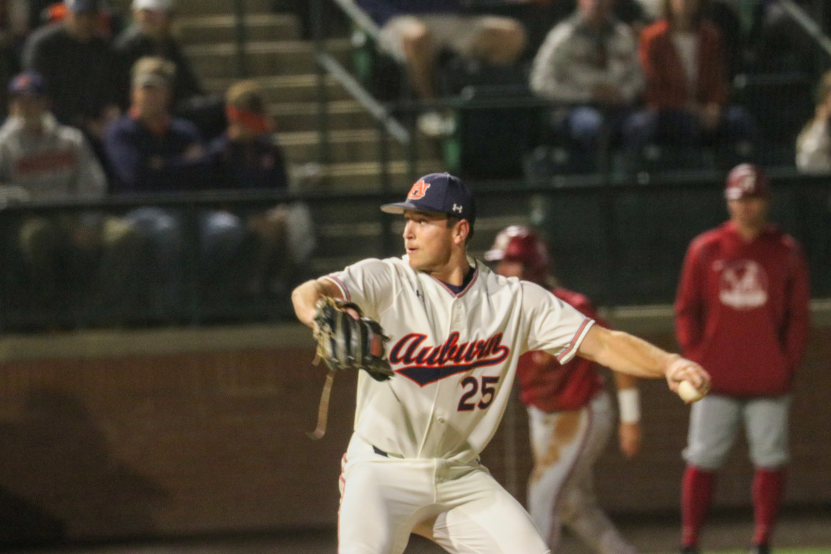 Tanner Bauman pitches for Auburn baseball.