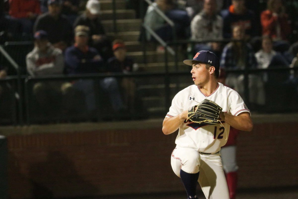 Drew Nelson pitching for Auburn baseball.