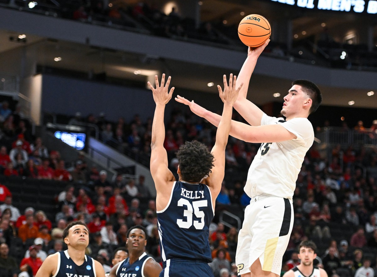 Mar 18, 2022; Milwaukee, WI, USA; Purdue Boilermakers center Zach Edey (15) shoots against Yale Bulldogs forward Isaiah Kelly (35) during the first half in the first round of the 2022 NCAA Tournament at Fiserv Forum.