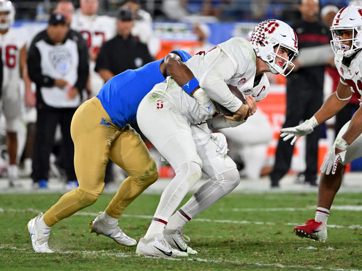 Stanford Cardinal quarterback Tanner McKee (18) is sacked by UCLA Bruins defensive back Stephan Blaylock (4) in the second half at the Rose Bowl.