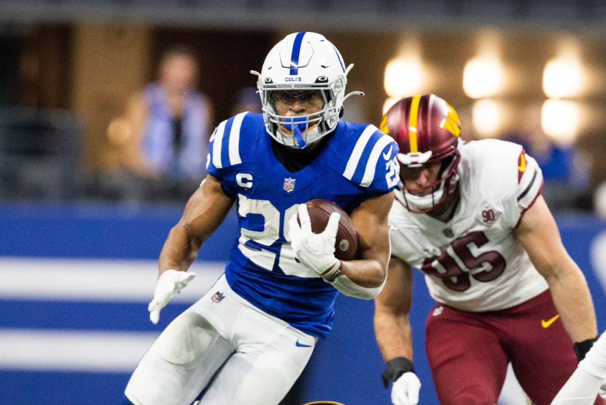 INDIANAPOLIS, IN - OCTOBER 30: Indianapolis Colts linebacker Shaquille  Leonard (53) heads up field after his interception during an NFL game  between the Washington Commanders and the Indianapolis Colts on October 30