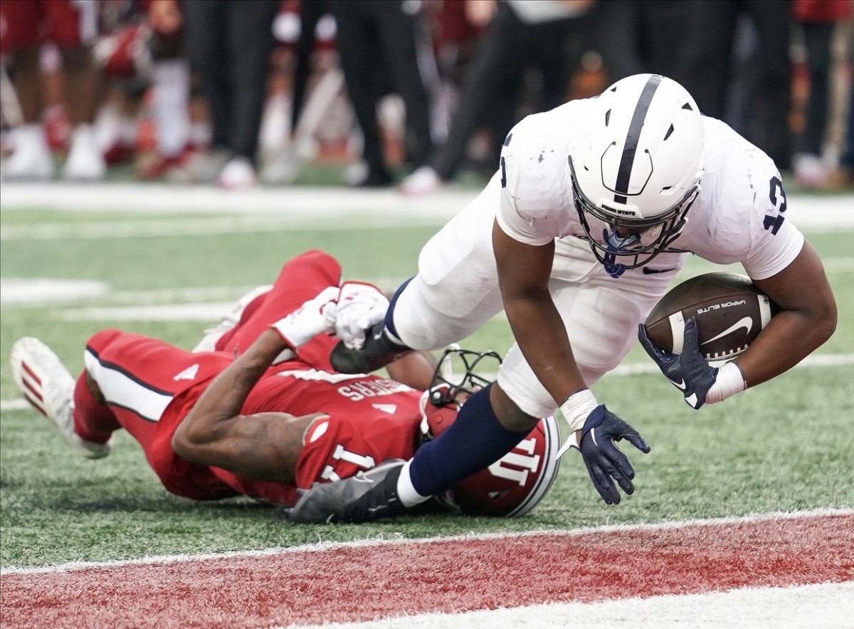 Penn State Nittany Lions running back Kaytron Allen (13) runs for a touchdown past Indiana Hoosiers defensive back Jonathan Haynes (17) during the first half at Memorial Stadium.