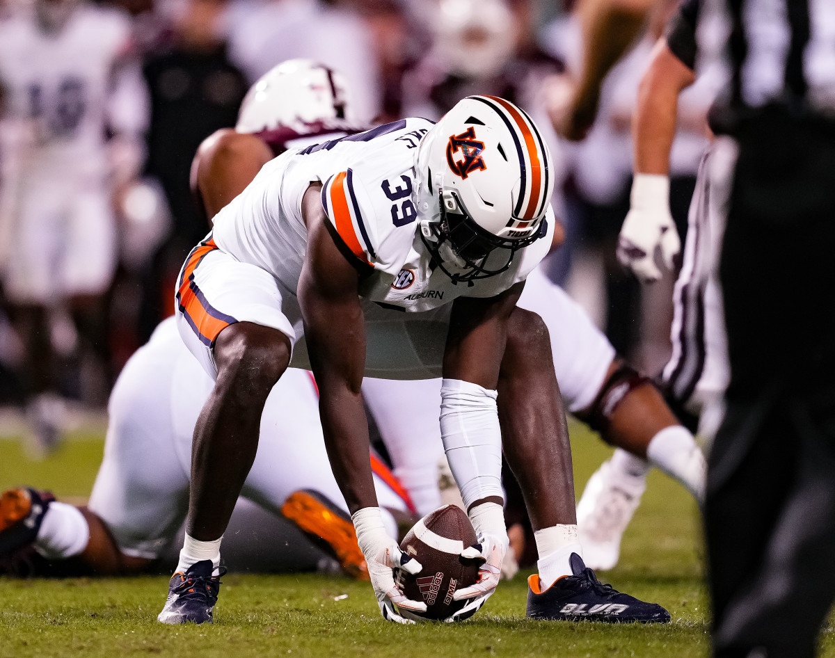 Nov 5, 2022; Starkville, MS, USA; Dylan Brooks (39) picks up the fumble for the turnover during the game between Auburn and Mississippi State at Davis Wade Stadium . Zach Bland/ AU Athletics