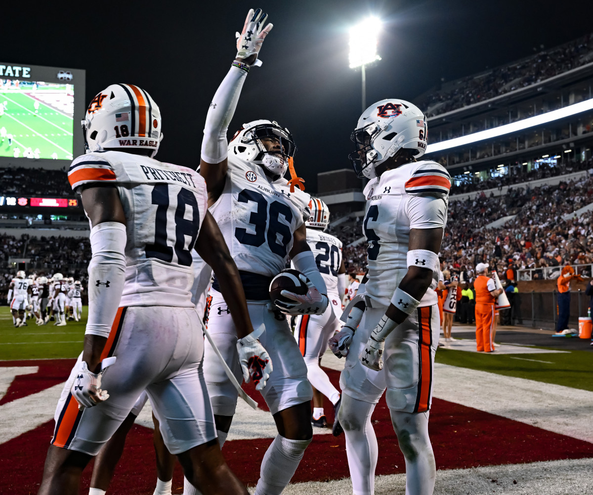 Nov 5, 2022; Starkville, MS, USA; Jaylin Simpson (36) celebrates interception during the game between Auburn and Mississippi State at Davis Wade Stadium . Todd Van Emst / AU Athletics