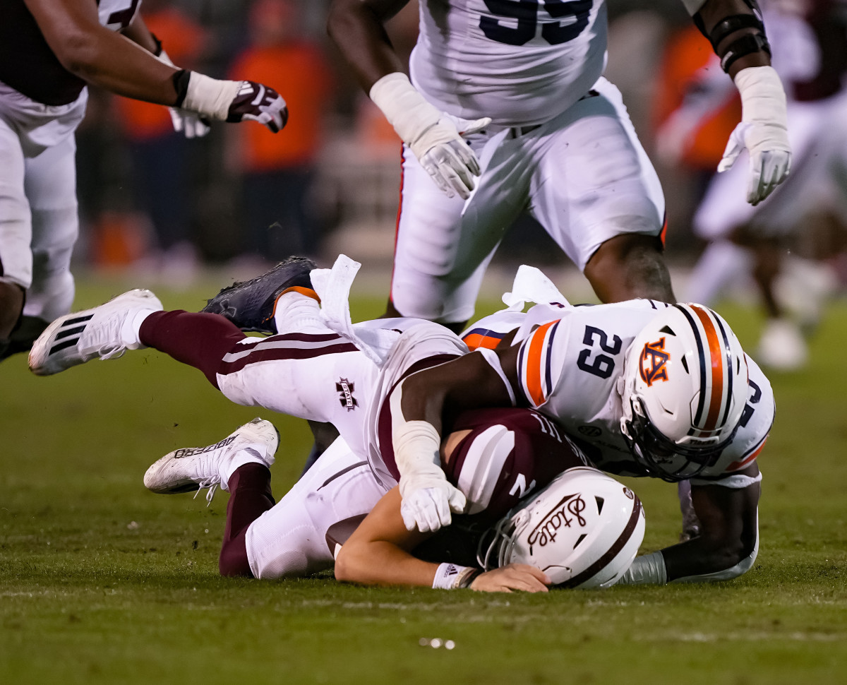 Nov 5, 2022; Starkville, MS, USA; Derick Hall (29) sacks Mississippi State quarterback during the game between Auburn and Mississippi State at Davis Wade Stadium . Austin Perryman / AU Athletics