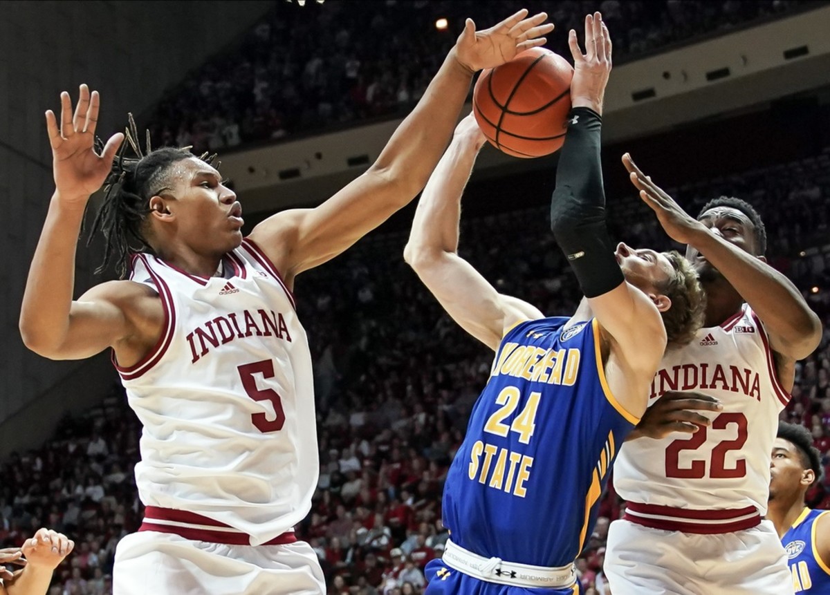 Indiana forwards Malik Reneau (5) and Jordan Geronimo (22) combine to block the shot attempt from Morehead State guard Jake Wolfe (24) during the second half.