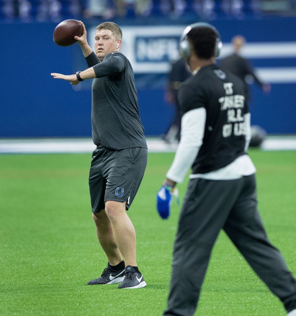 Parks Frazier, the Colts assistant coach, throws footballs to players before the start of their game before the start of their game against the Jacksonville Jaguars at Lucas Oil Stadium on Sunday, Nov. 11, 2018. Indianapolis Colts Play The Jacksonville Jaguars