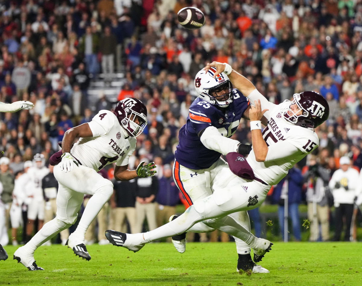 Colby Wooden (25) forces the quarterback to throw off balance during the football game between the Texas A&M Aggies and the Auburn Tigers at Jordan Hare Stadium in Auburn, AL on Saturday, Nov 12, 2022. Zach Bland/Auburn Tigers