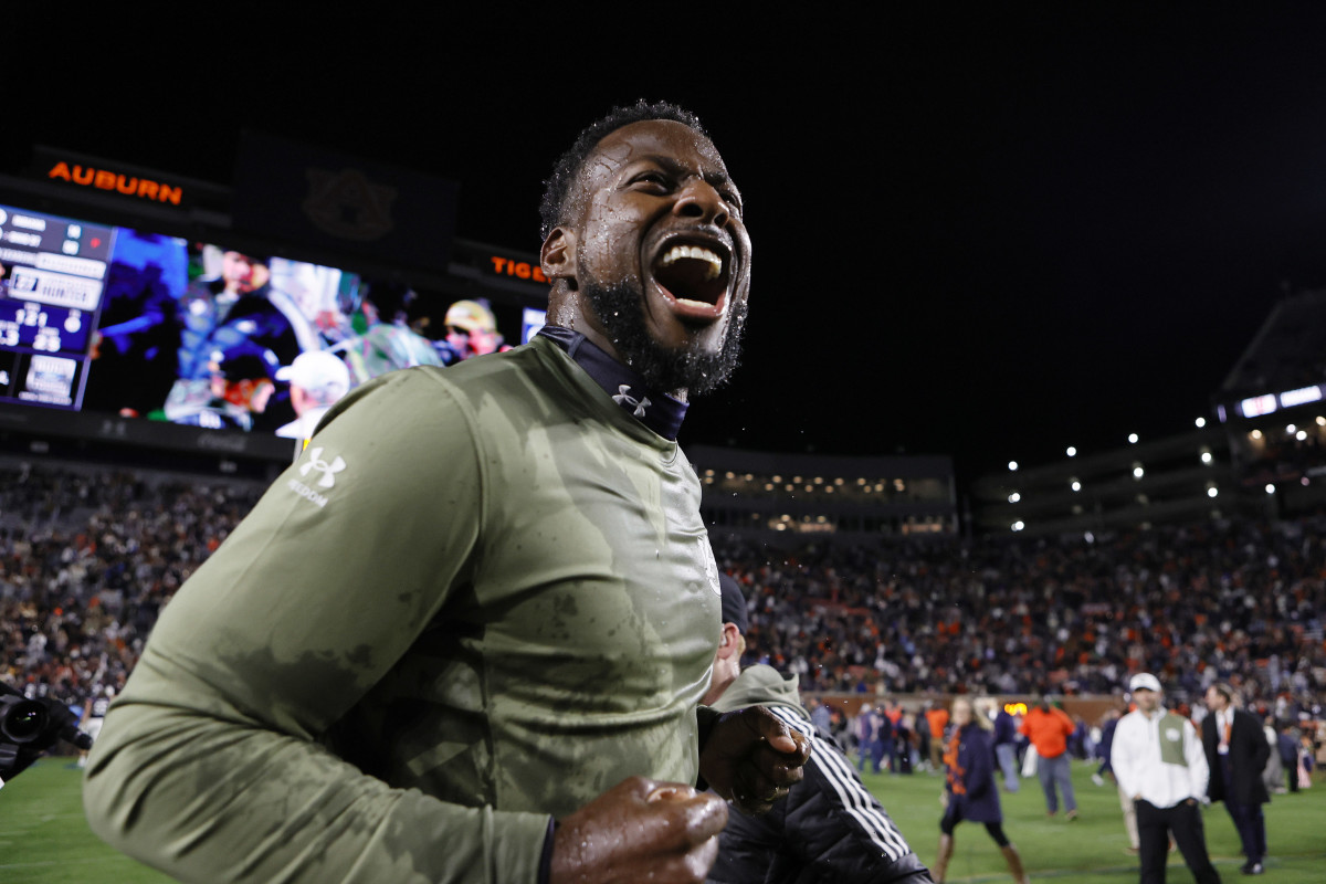 Nov 12, 2022; Auburn, Alabama, USA; Auburn Tigers interim head coach Carnell Williams celebrates after the Tigers snapped a 5-game losing streak and beat the Texas A&M Aggies at Jordan-Hare Stadium. Mandatory Credit: John Reed-USA TODAY Sports