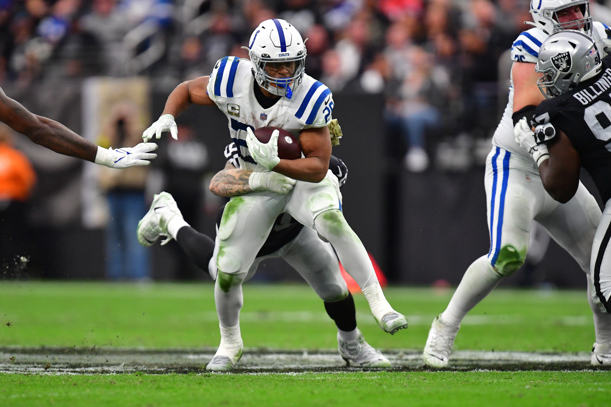 Nov 13, 2022; Paradise, Nevada, USA; Indianapolis Colts running back Jonathan Taylor (28) runs the ball against the Las Vegas Raiders during the first half at Allegiant Stadium.