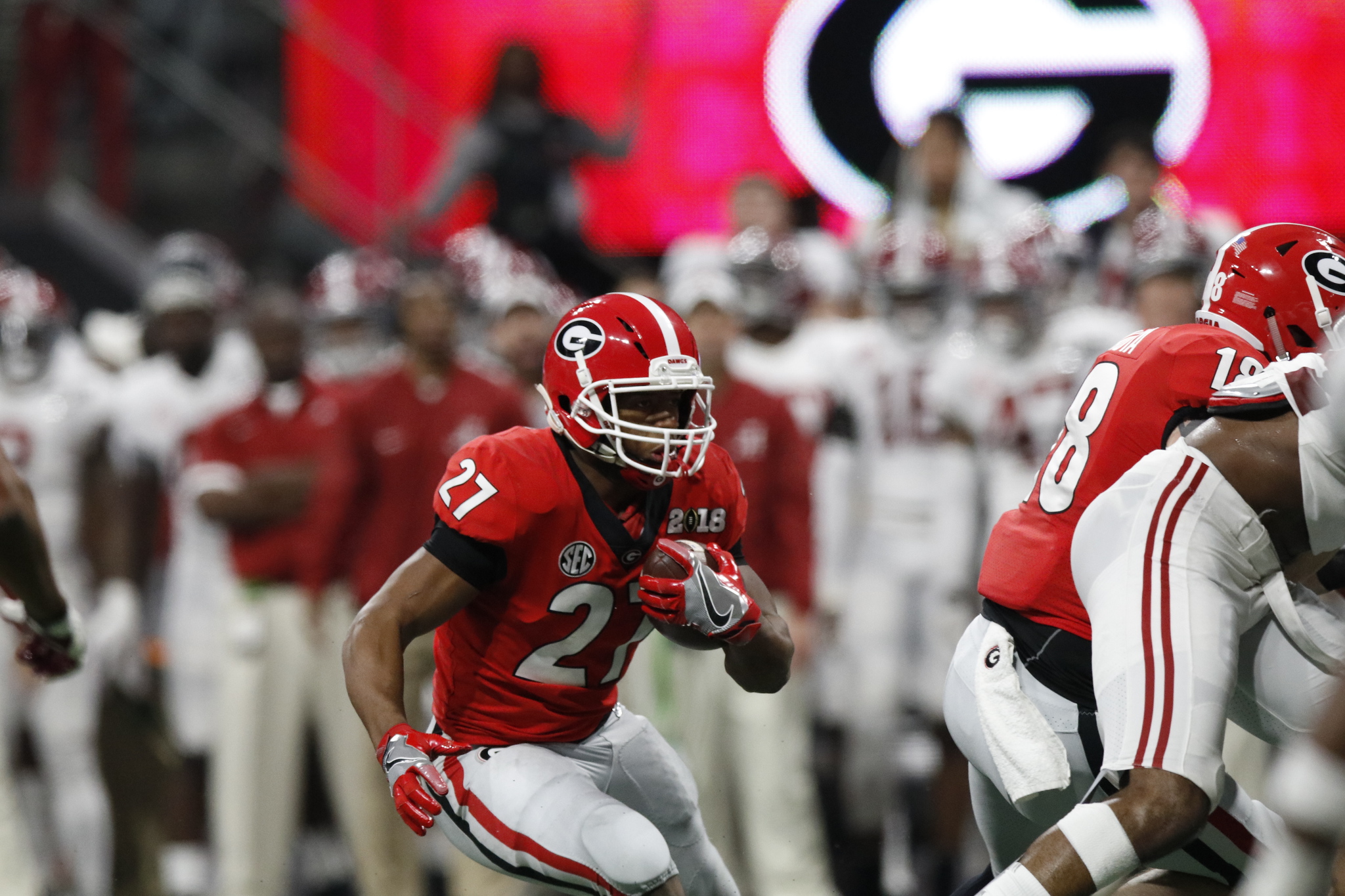 Bulldogs In The NFL - Image 18: Cleveland Browns running back Nick Chubb  (24) rushes during the first half of an NFL football game against the  Buffalo Bills, Sunday, Nov. 10, 2019