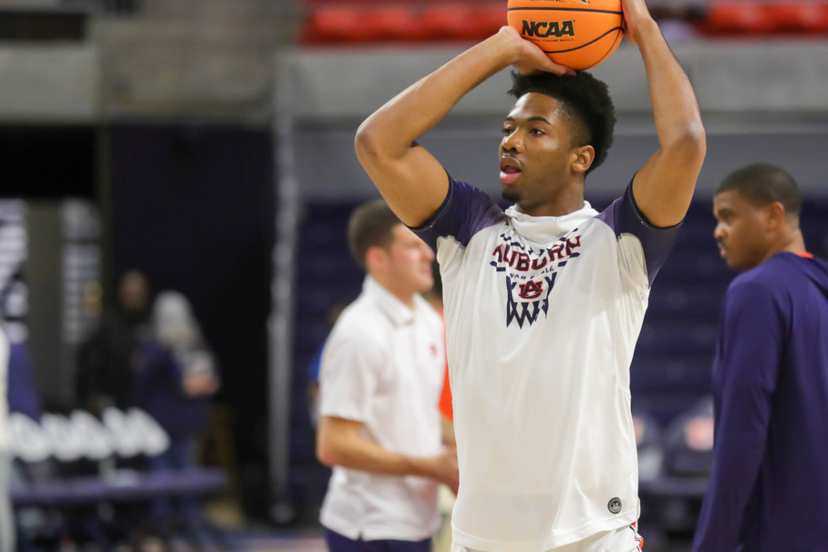 Yohan Traore warms up before Winthrop