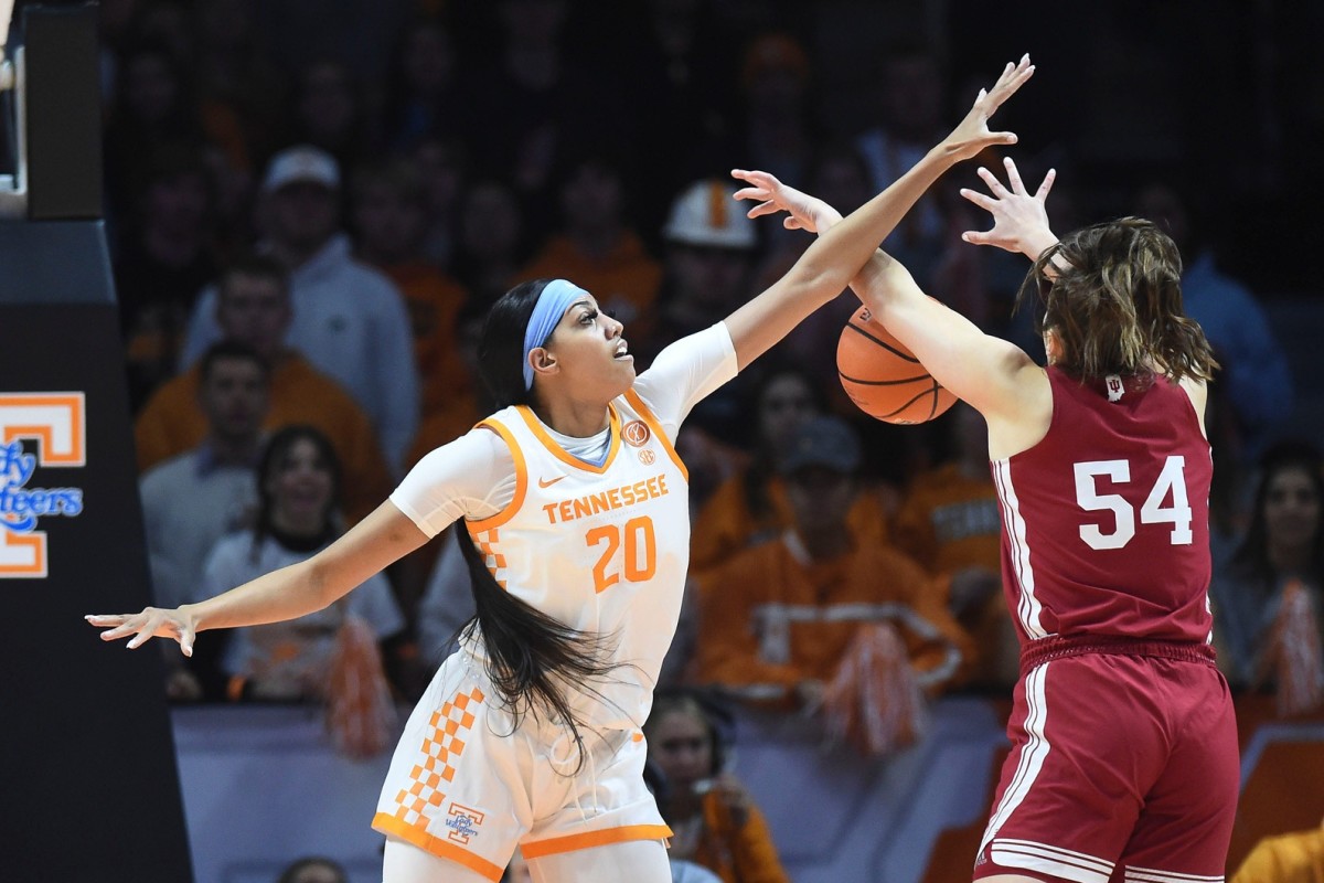 Tennessee center Tamari Key (20) blocks a shot attempt by Indiana forward Mackenzie Holmes (54) during the NCAA college basketball game on Monday, November 14, 2022 in Knoxville, Tenn.