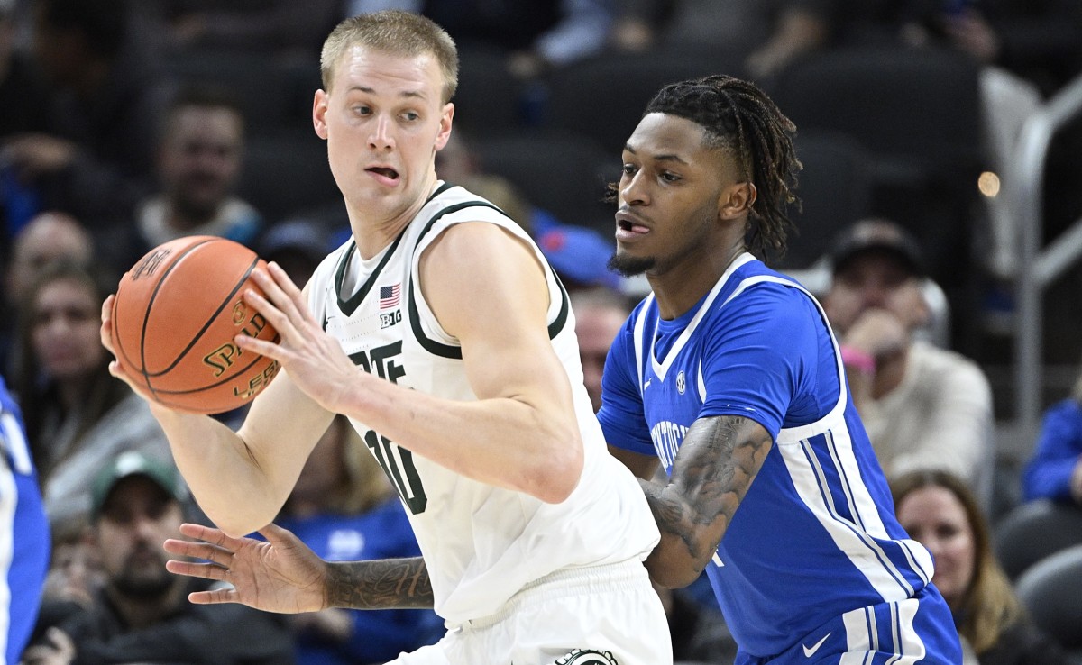 Joey Hauser (left) scored 23 points and led Michigan State to a double-overtime win over No. 4 Kentucky on Tuesday night in Indianapolis (USA TODAY Sports)