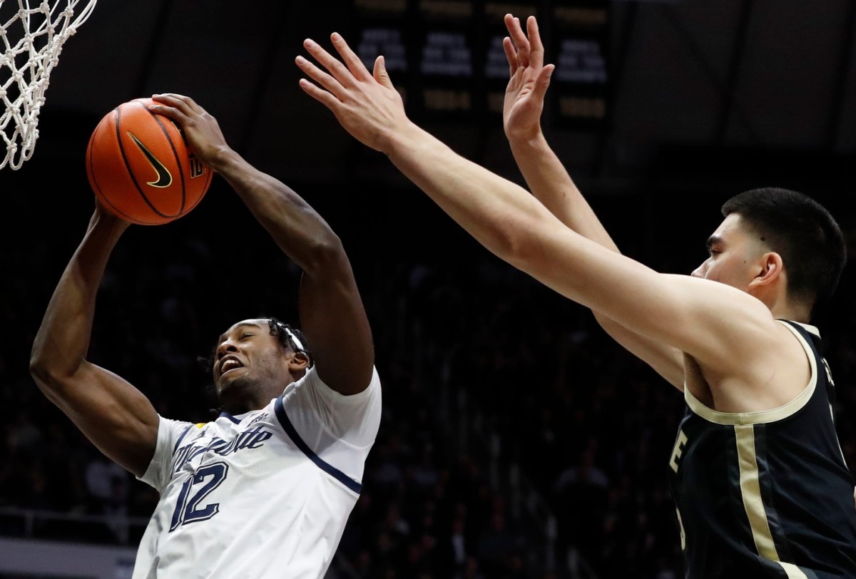 zach edey block vs marquette