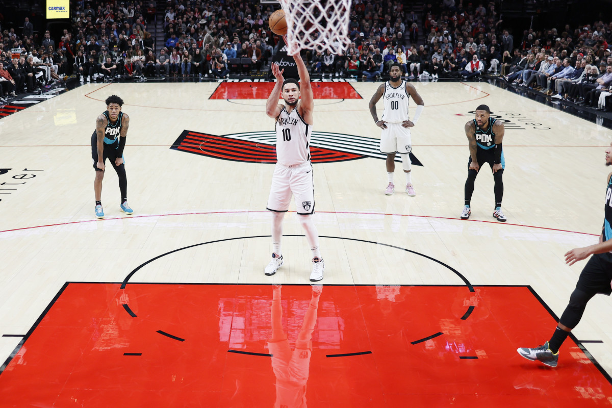 Nov 17, 2022; Portland, Oregon, USA; Brooklyn Nets point guard Ben Simmons (10) shoots a free throw during the second half against the Portland Trail Blazers at Moda Center. Mandatory Credit: Soobum Im-USA TODAY Sports