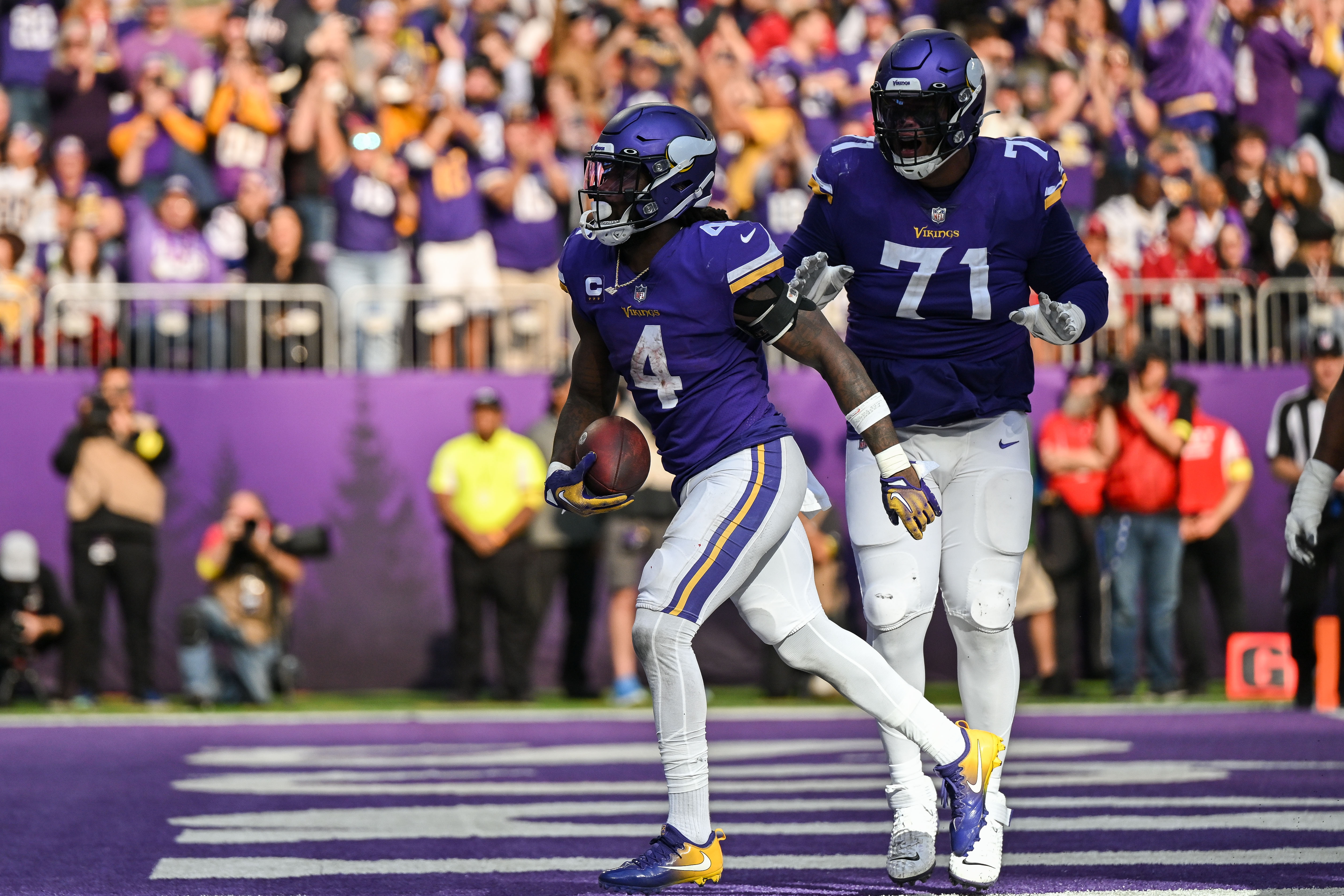 EAGAN, MN - JULY 27: Minnesota Vikings offensive tackle Christian Darrisaw  (71) takes the field during the first day of Minnesota Vikings Training  Camp at TCO Performance Center on July 27, 2022