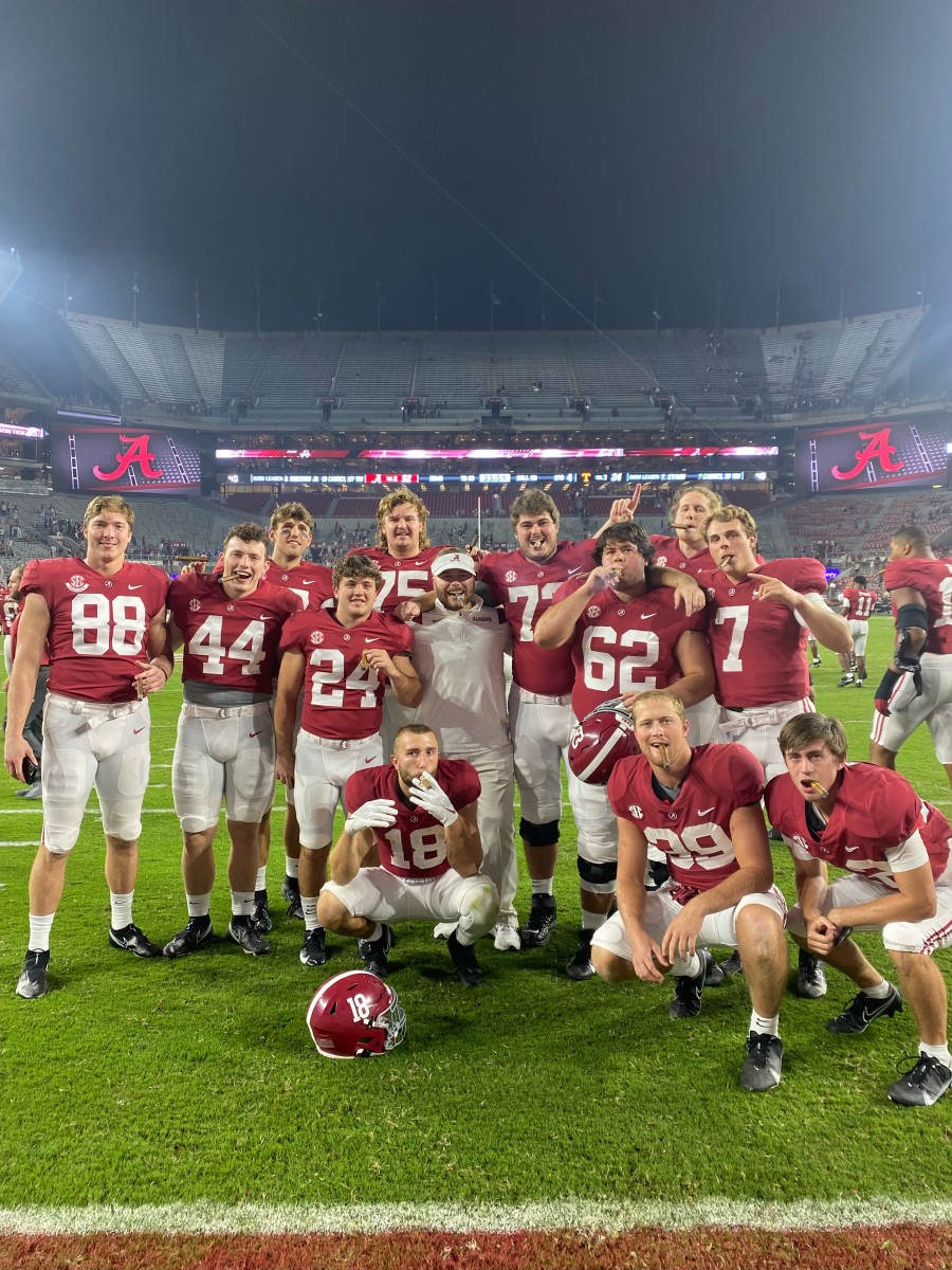 Jackson Roby and teammates celebrating after beating Tennessee