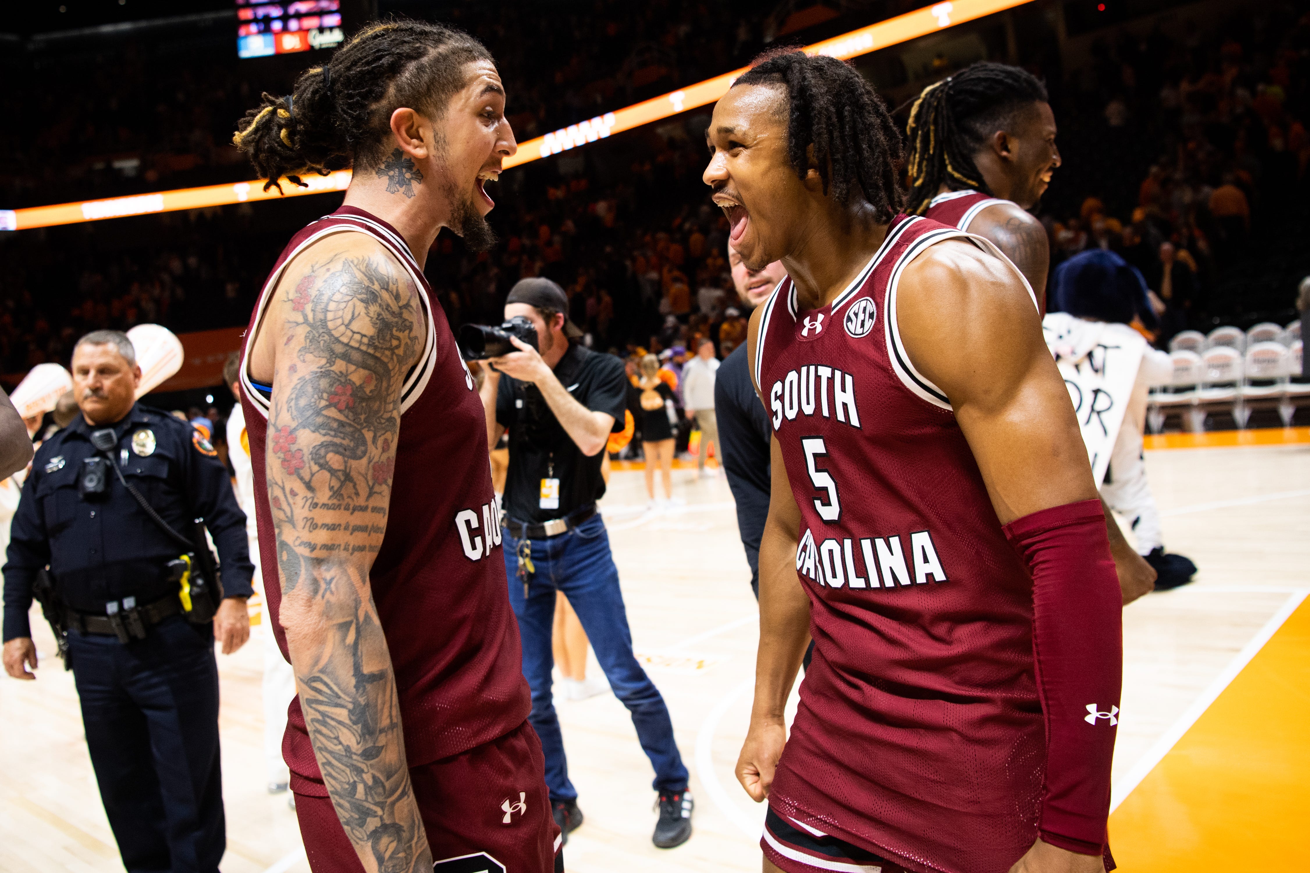 Myles Stute and Meechie Johnson celebrating on the floor after defeating No. 5 Tennessee (30th Jan., 2024)