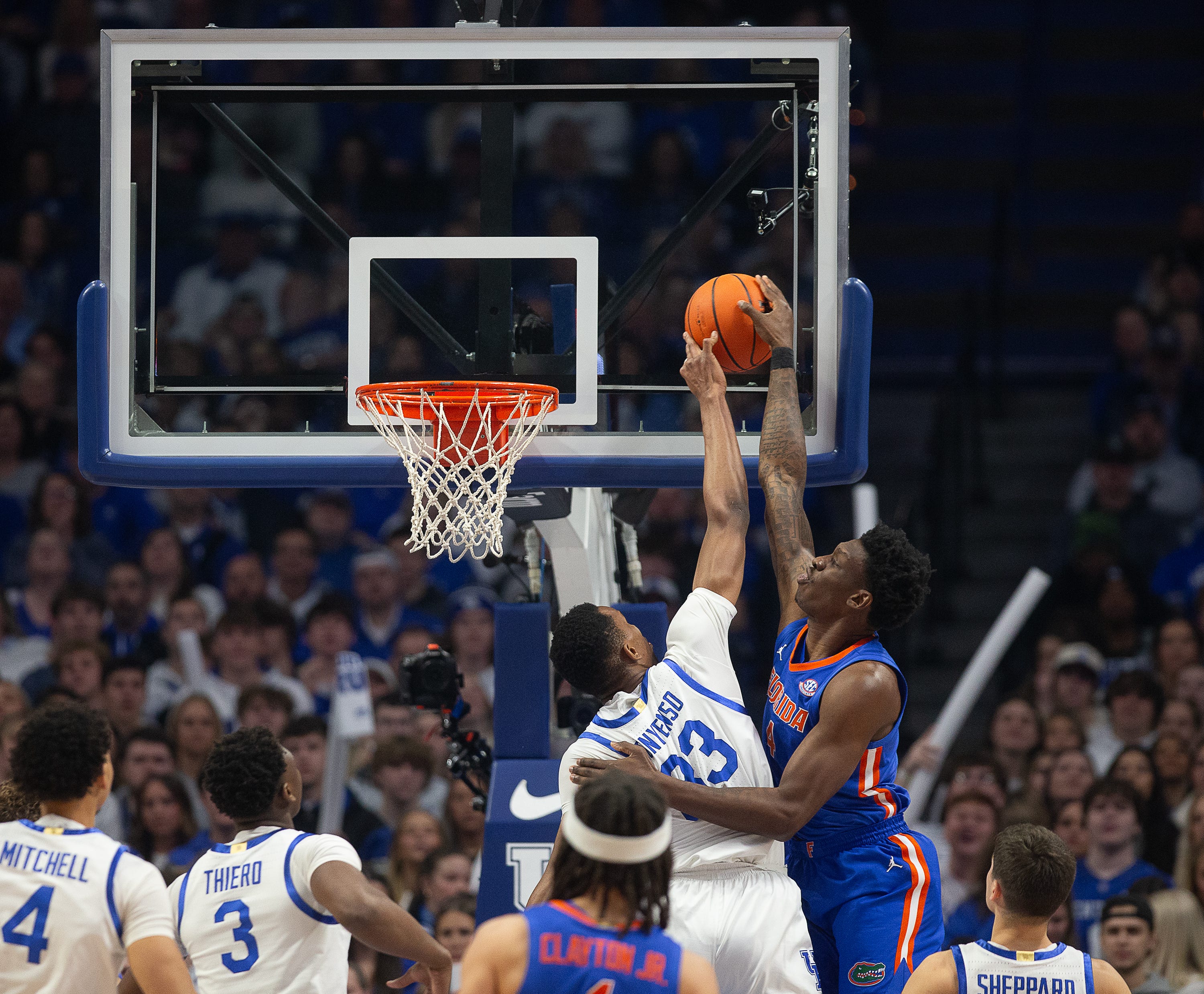 Kentucky's Ugonna Onyenso (33) blocked the shot of Florida's Tyrese Samuel (4) during first half action as the Kentucky Wildcats battled the Florida Gators Wednesday night at Rupp Arena. Jan. 31, 2024