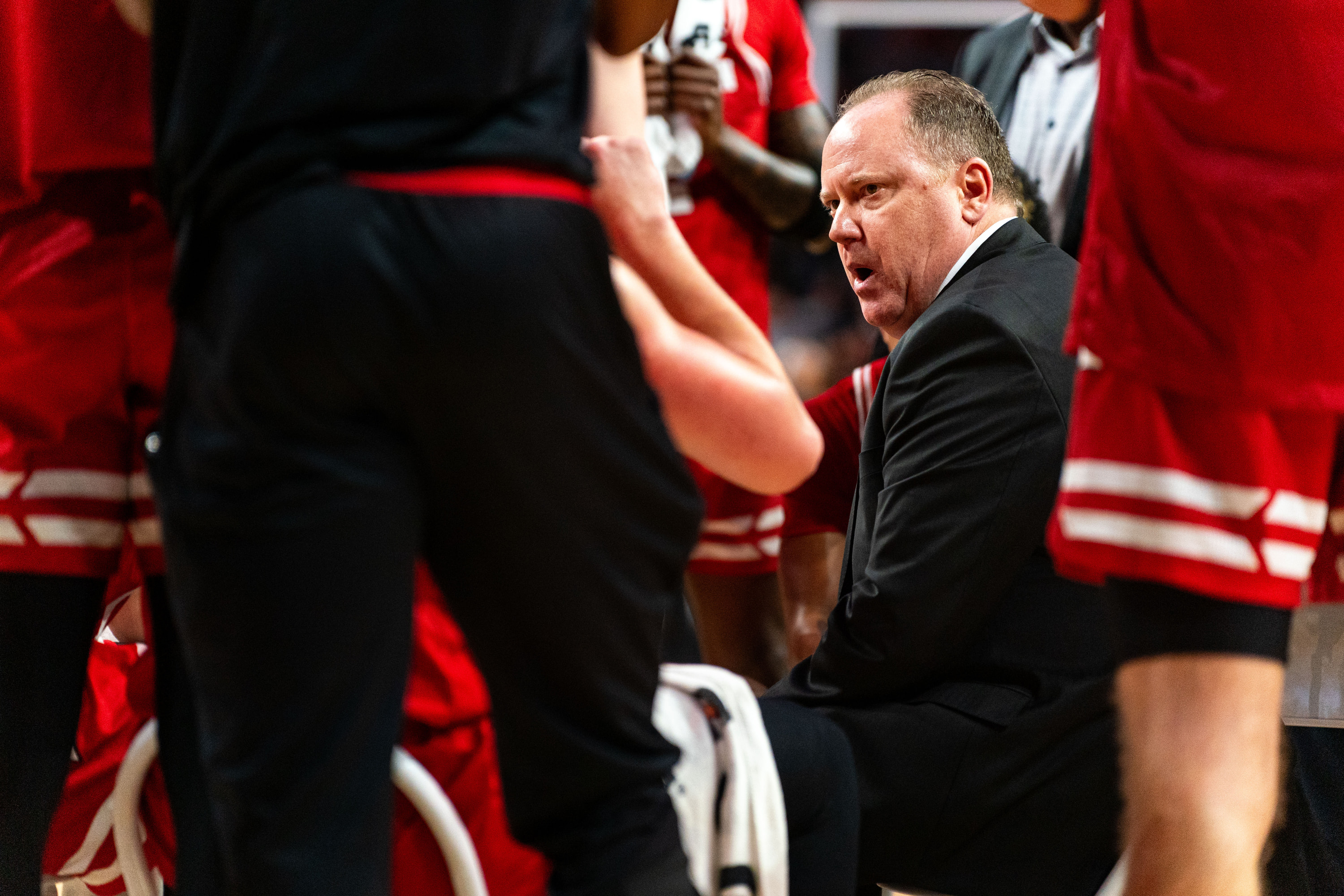 Feb 1, 2024; Lincoln, Nebraska, USA; Wisconsin Badgers head coach Greg Gard talks to players during a timeout against the Nebraska Cornhuskers in the first half at Pinnacle Bank Arena.