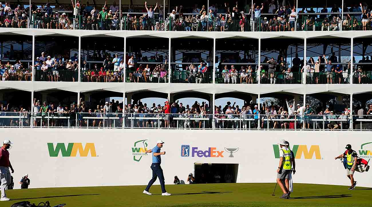 Scottie Scheffler reacts after making his par putt on the 16th hole during the final round of the 2023 WM Phoenix Open at TPC Scottsdale.