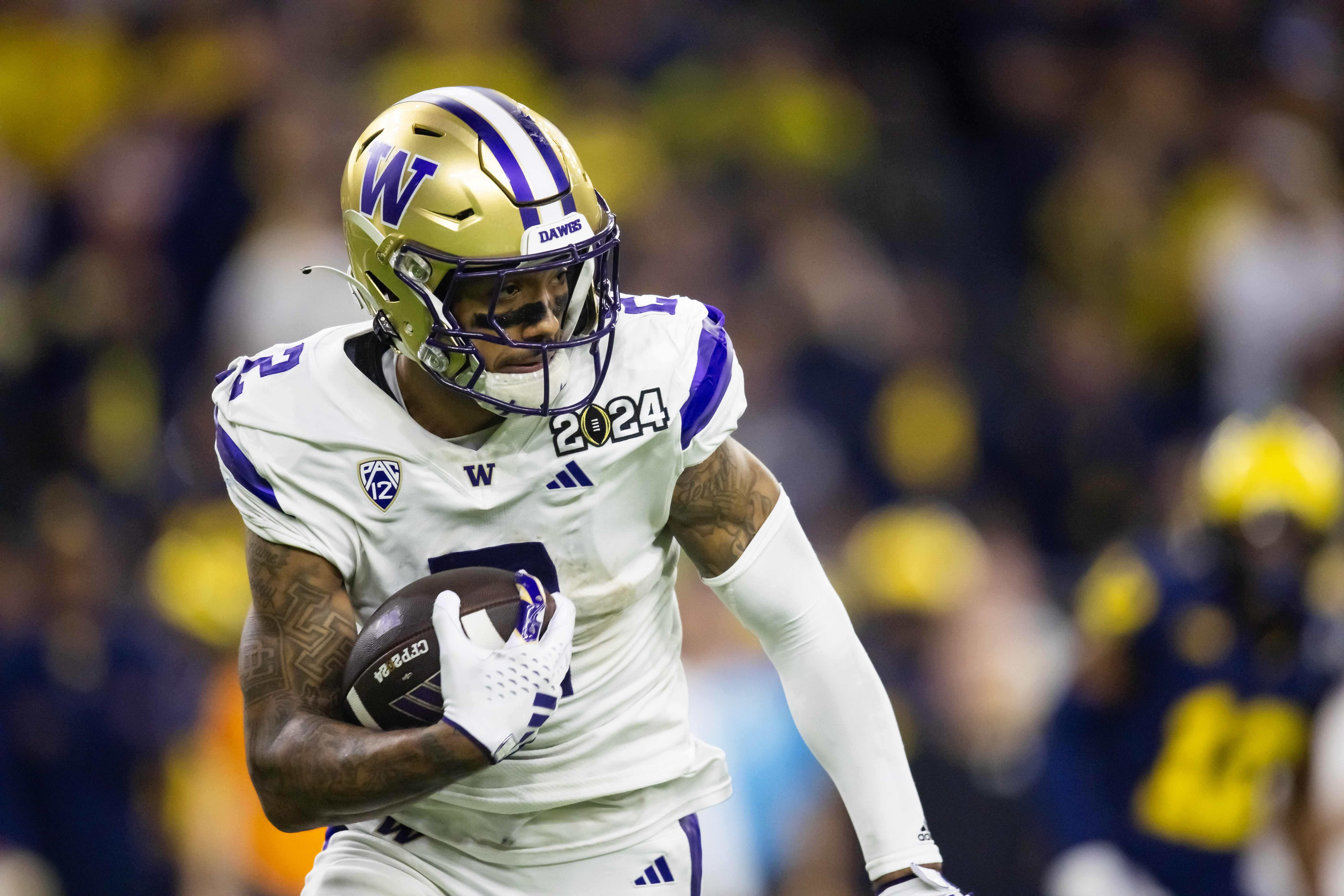 Washington Huskies wide receiver Ja'Lynn Polk (2) against the Michigan Wolverines during the 2024 College Football Playoff national championship game at NRG Stadium.