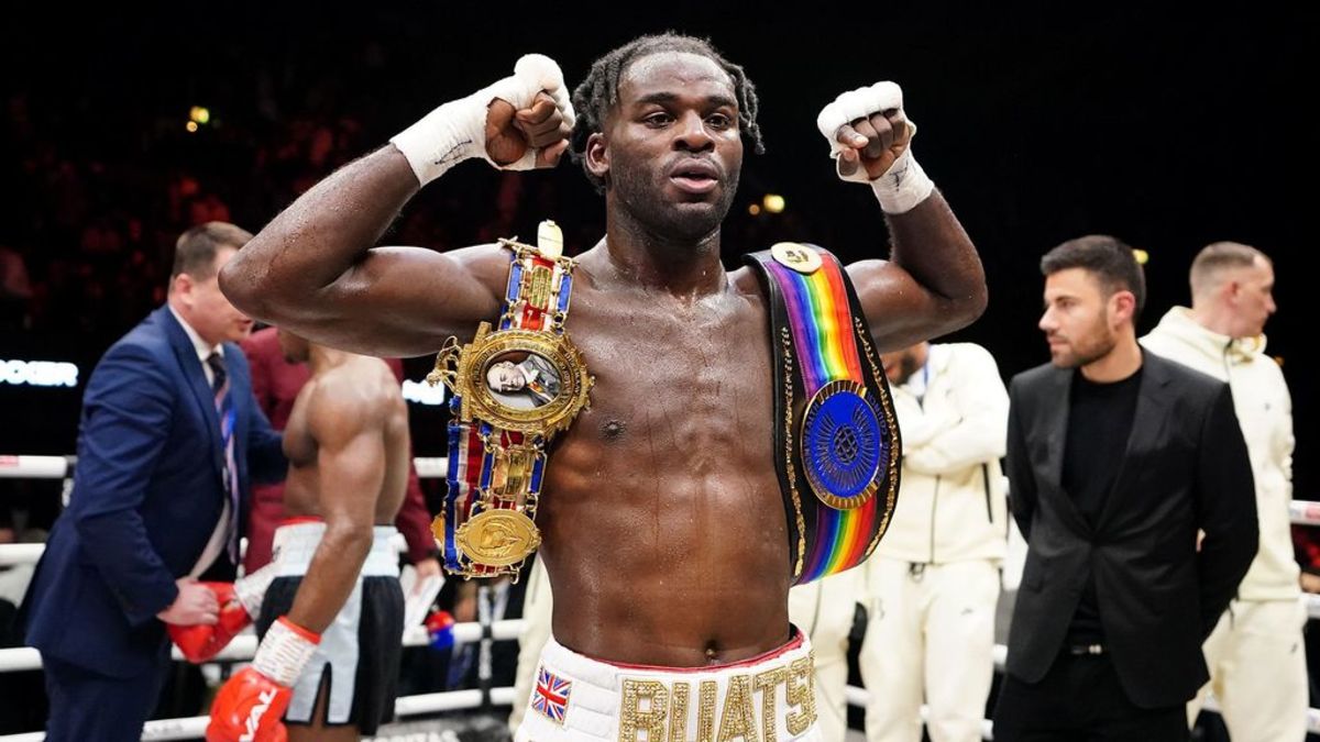 Joshua Buatsi celebrates victory with the belt following the British and Commonwealth Light Heavyweight title fight between him and Dan Azeez at OVO Arena Wembley in London, England. JAMES CHANCE/GETTY IMAGES.