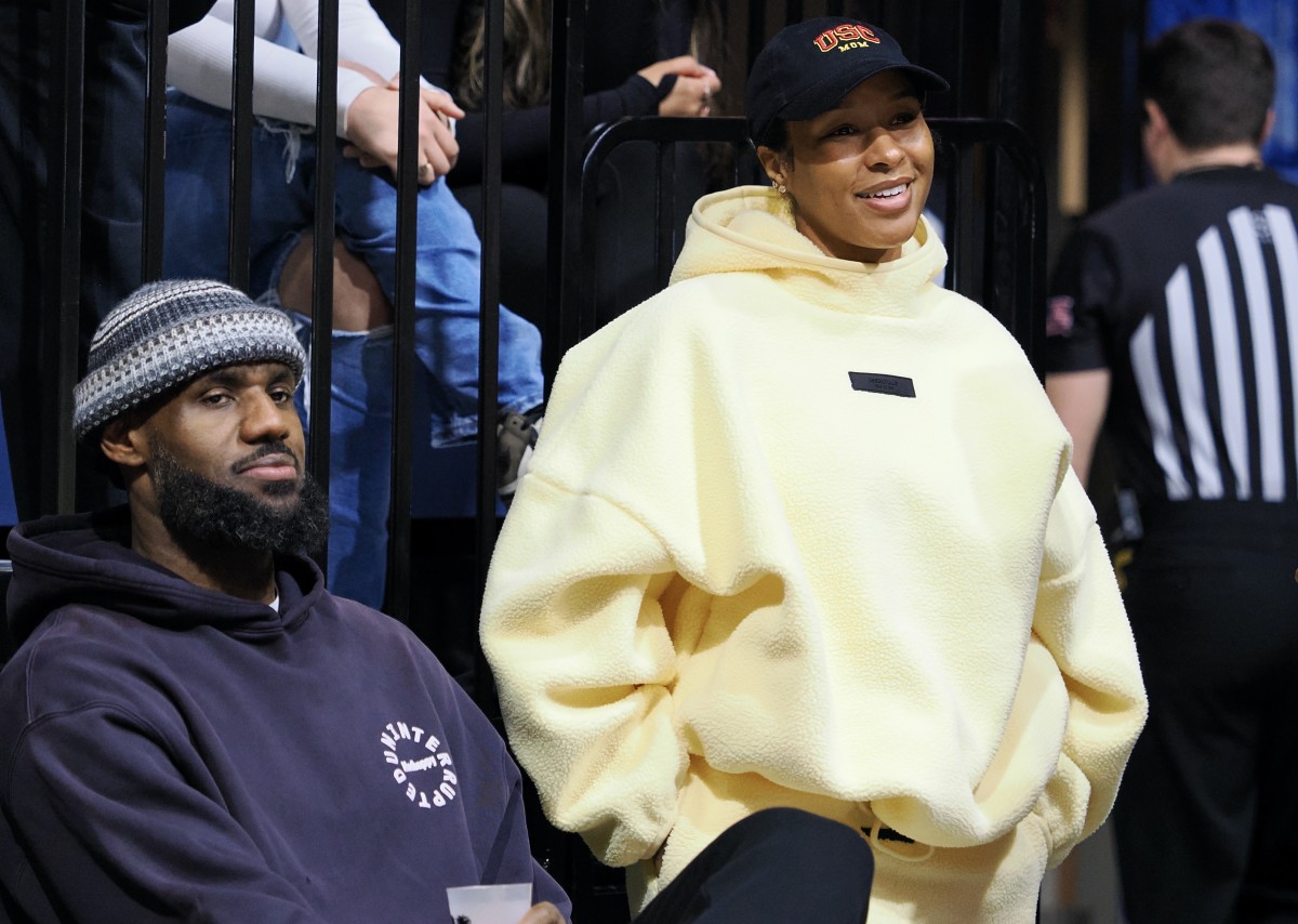 LeBron James watches his son Bronny from the baseline.