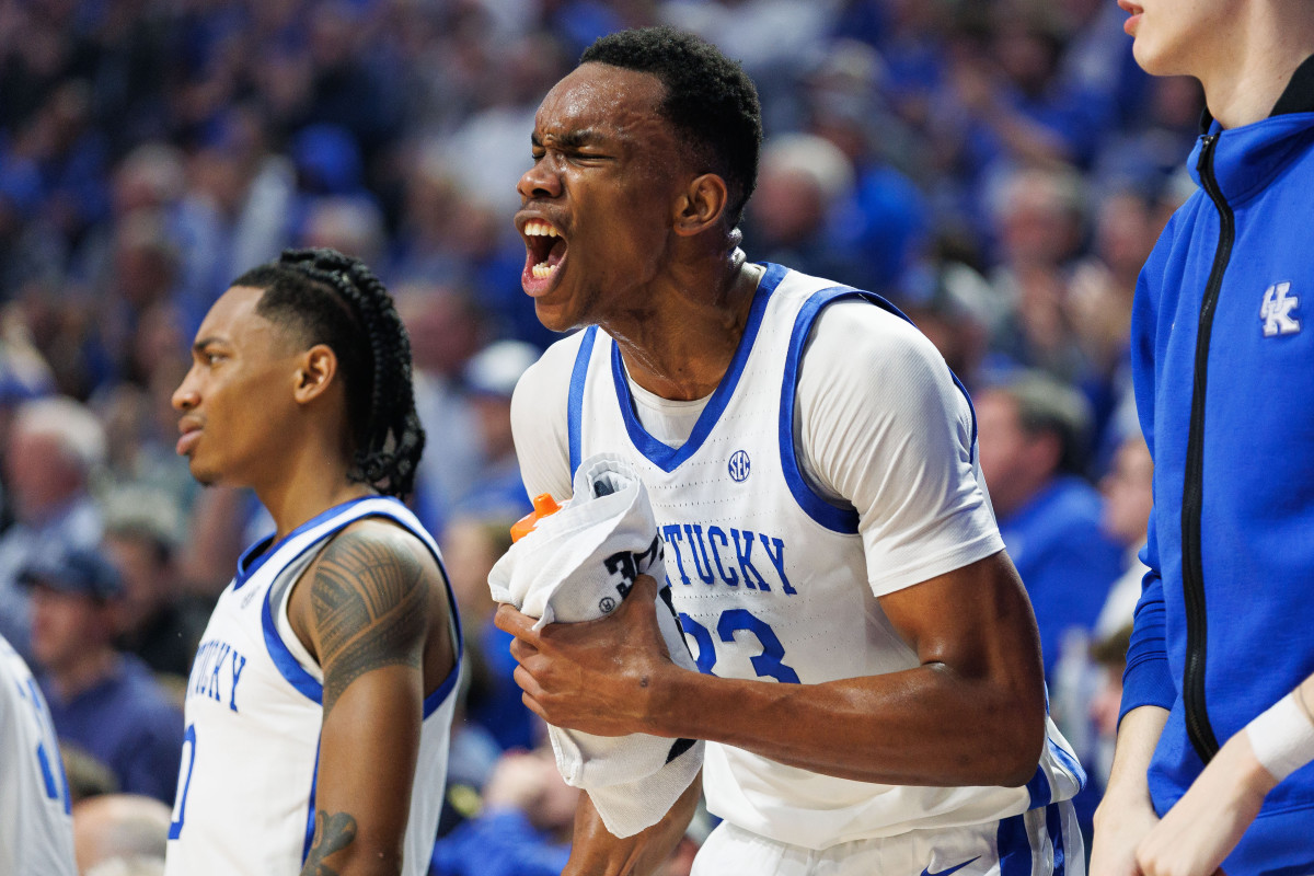 Feb 13, 2024; Lexington, Kentucky, USA; Kentucky Wildcats forward Ugonna Onyenso (33) celebrates from the bench during the first half against the Ole Miss Rebels at Rupp Arena at Central Bank Center. Mandatory Credit: Jordan Prather-USA TODAY Sports