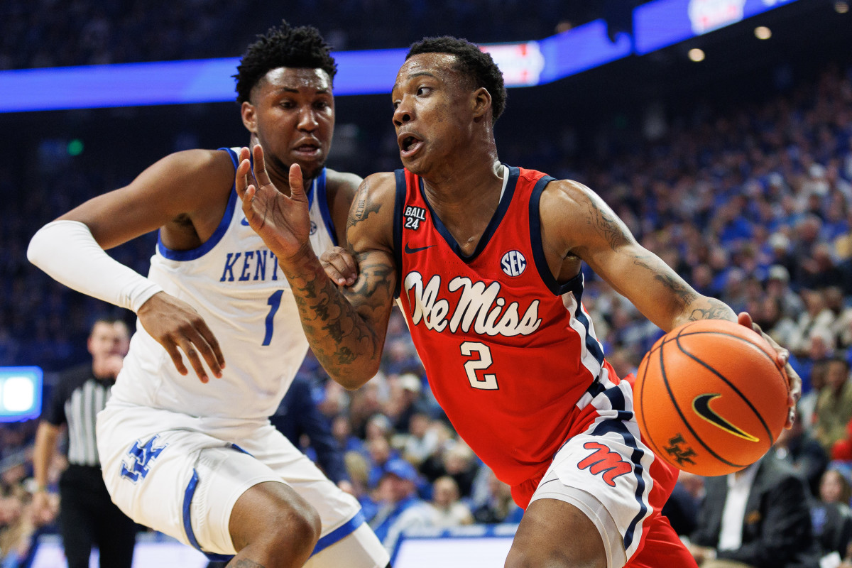 Feb 13, 2024; Lexington, Kentucky, USA; Ole Miss Rebels guard TJ Caldwell (2) drives to the basket around Kentucky Wildcats guard Justin Edwards (1) during the first half at Rupp Arena at Central Bank Center. Mandatory Credit: Jordan Prather-USA TODAY Sports