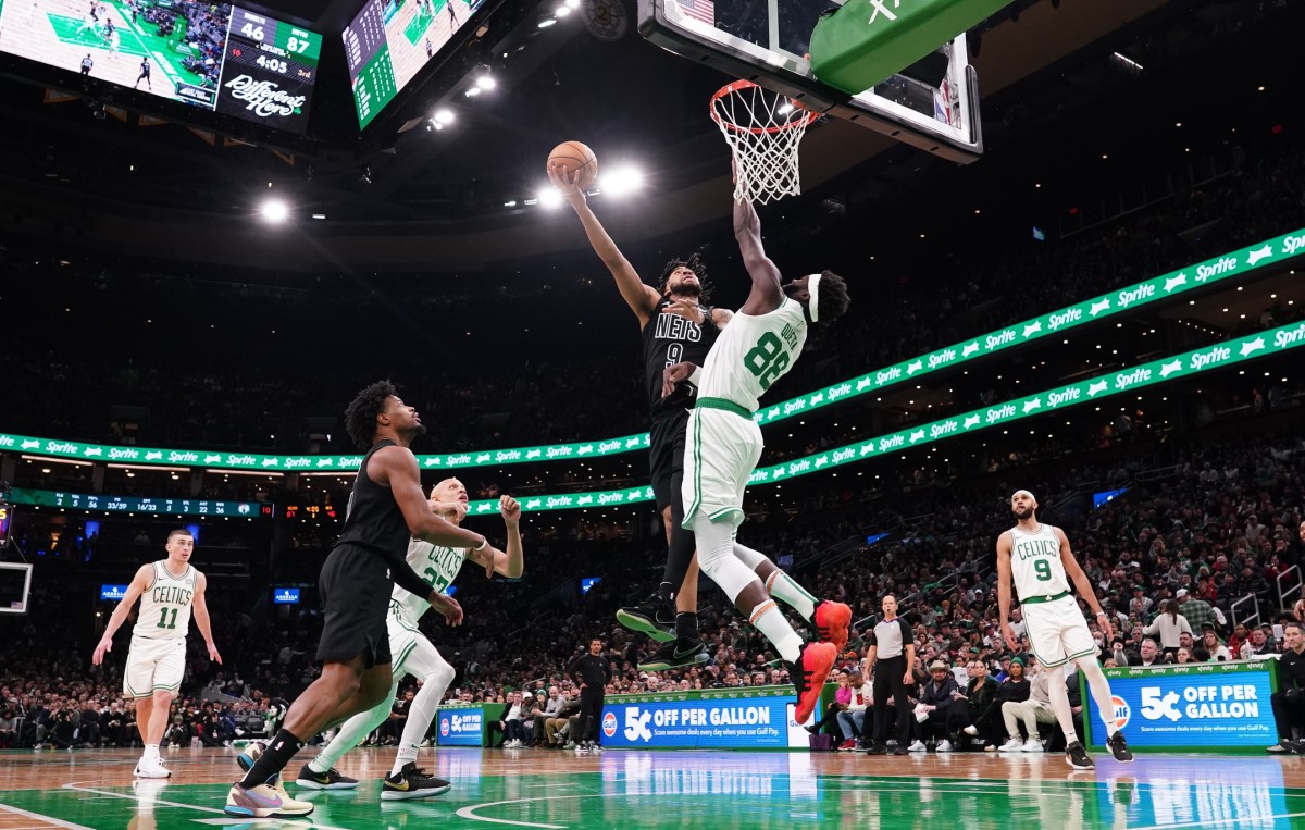  Brooklyn Nets forward Trendon Watford (9) shoots against Boston Celtics center Neemias Queta (88) in the second half at TD Garden.