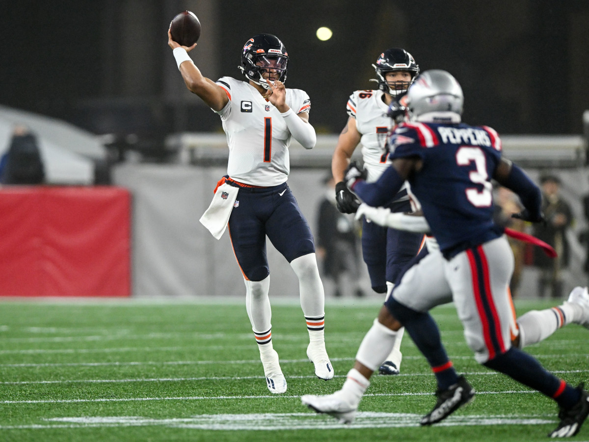 Oct 24, 2022; Foxborough, Massachusetts, USA; Chicago Bears quarterback Justin Fields (1) passes the ball against the New England Patriots during the first half at Gillette Stadium. 