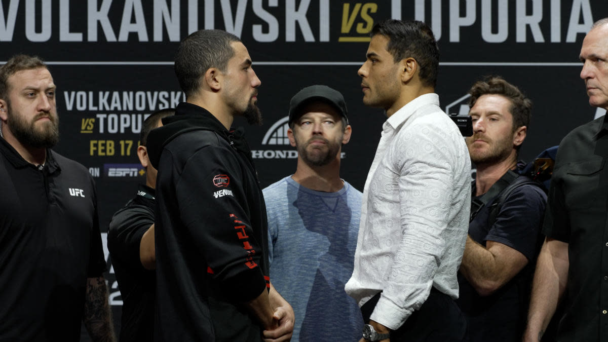 Robert Whittaker stares down Paulo Costa ahead of UFC 298.