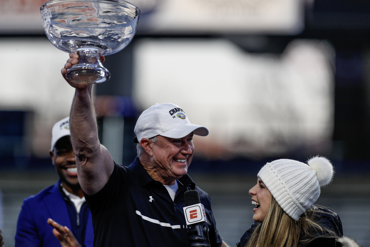 Shawn Elliott holding the Idaho Potato Bowl trophy during his postgame interview (23rd Dec., 2023)