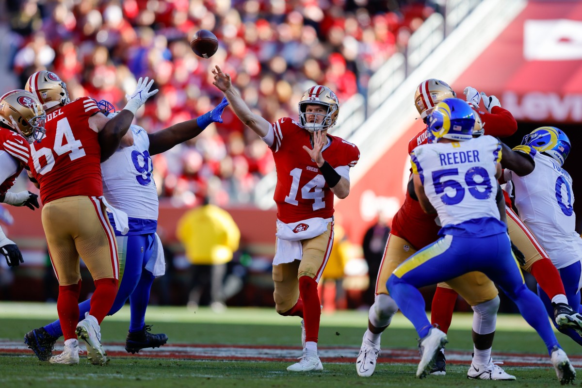 San Francisco 49ers quarterback Sam Darnold (14) throws a pass against the Los Angeles Rams. Mandatory Credit: Sergio Estrada-USA TODAY Sports