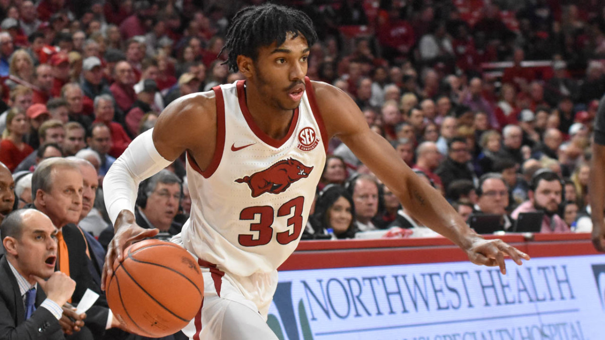 Razorbacks' Jimmy Whitt driving in a game from 2020