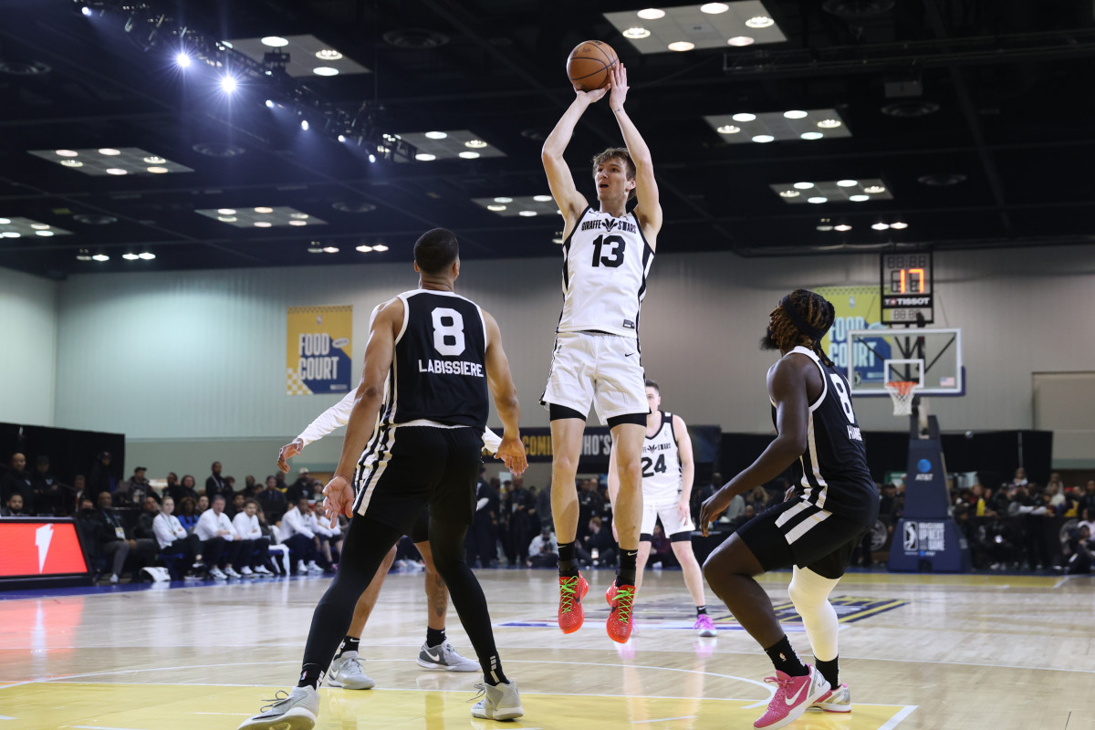 Team Giraffe Stars forward Matas Buzelis (13) of the G League Ignite shoots the ball over Team BallIsLife forward-center Skal Labissiere (8) of the Stockton Kings during the G-League Next Up game at Indiana Convention Center.