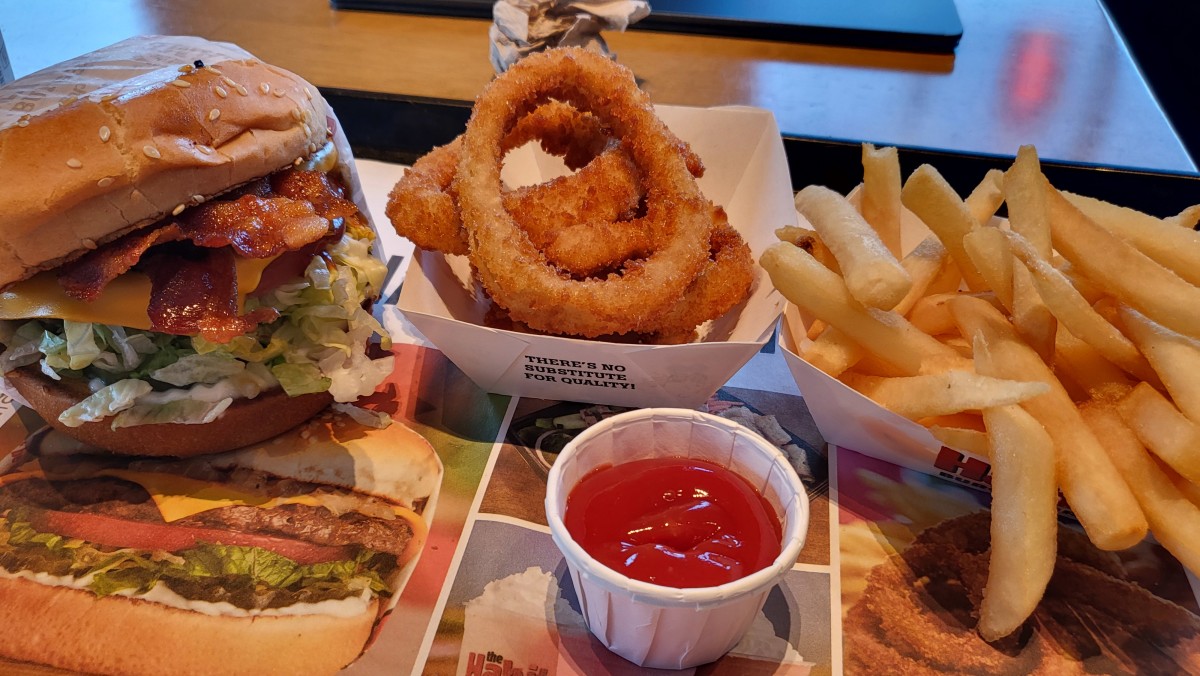 The BBQ Bacon Char Burger at The Habit Burger Grill comes loaded with tomatoes, pickles, onions and lettuce, plus barbecue sauce. It can quickly get out of control if you're not careful. Eat quickly.