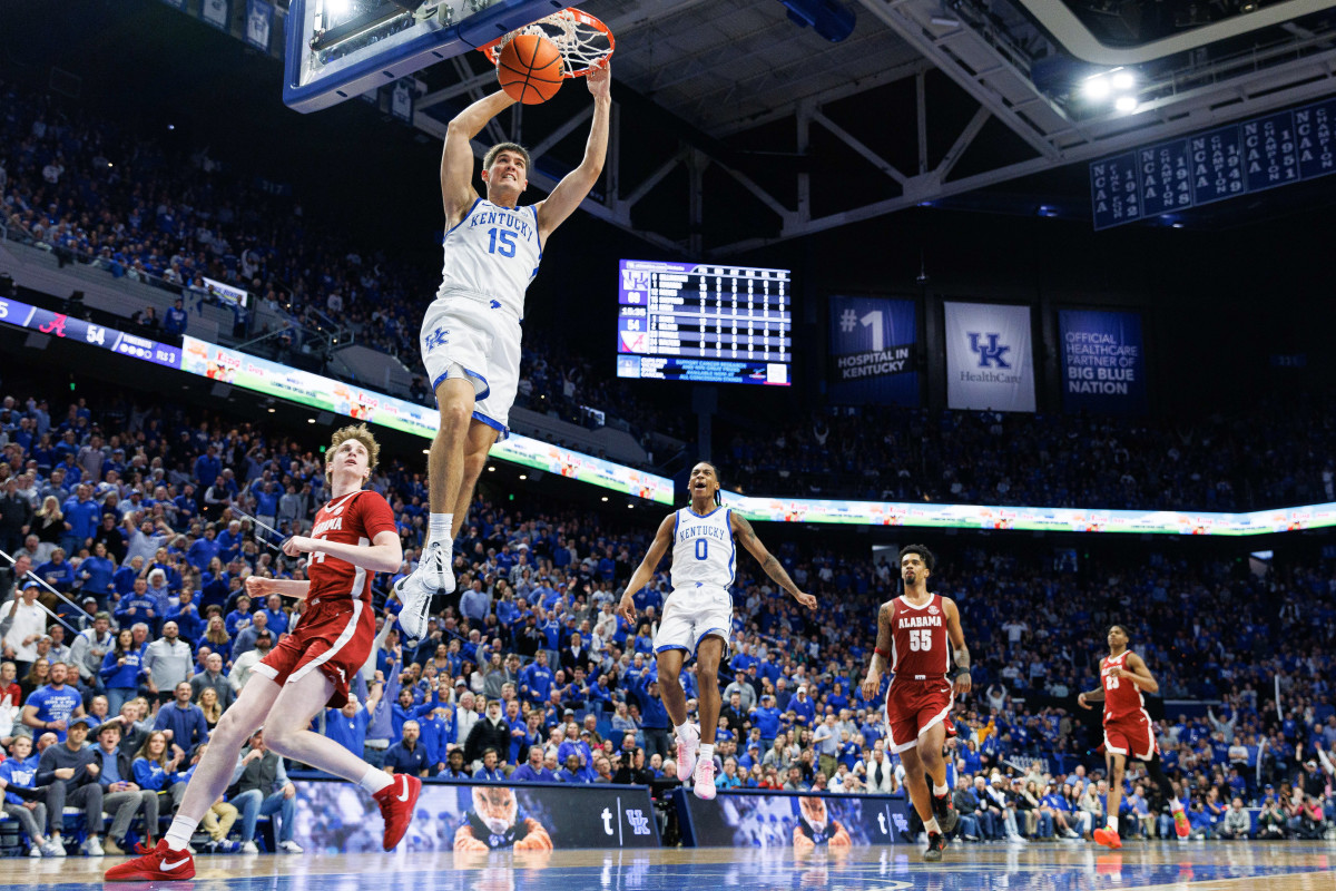 Feb 24, 2024; Lexington, Kentucky, USA; Kentucky Wildcats guard Reed Sheppard (15) dunks the ball during the second half against the Alabama Crimson Tide at Rupp Arena at Central Bank Center. Mandatory Credit: Jordan Prather-USA TODAY Sports