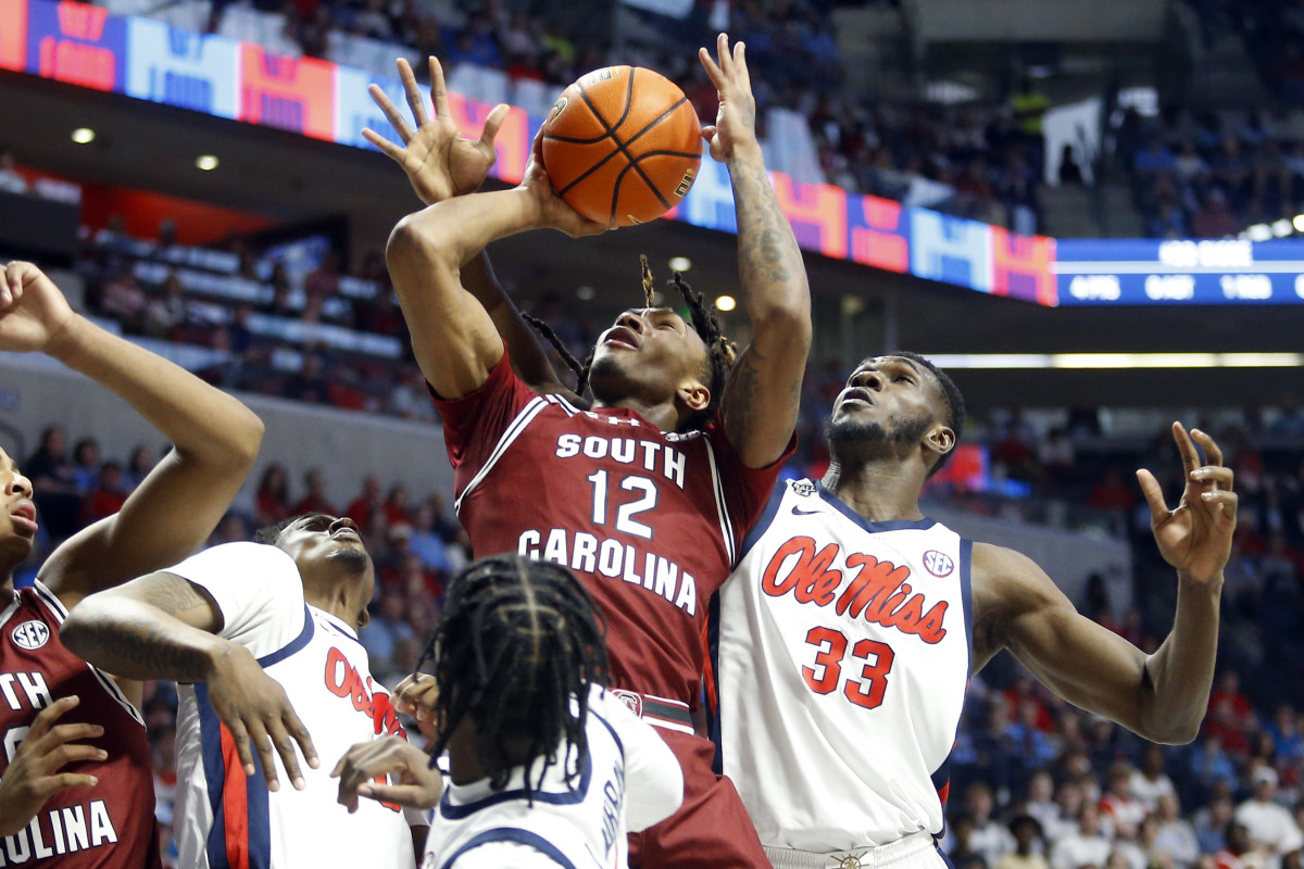 Zachary Davis goes to put the ball back up against three Ole Miss defenders (25th Feb., 2024)